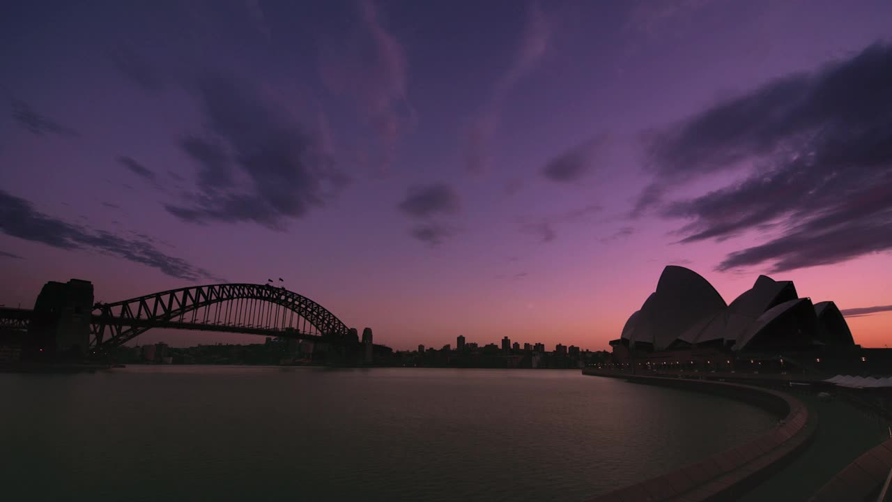 时间流逝黎明与悉尼海港大桥和悉尼歌剧院/悉尼，澳大利亚视频下载