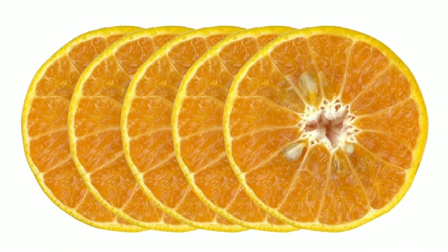 特写镜头的橙色切片打开白色的背景视频素材