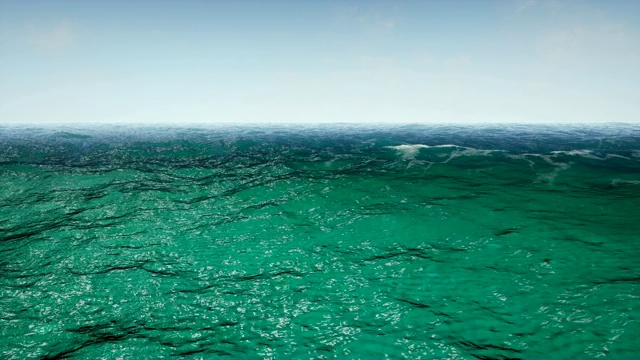 飞过平静的海洋蓝天。动画的无缝循环。4 k视频下载