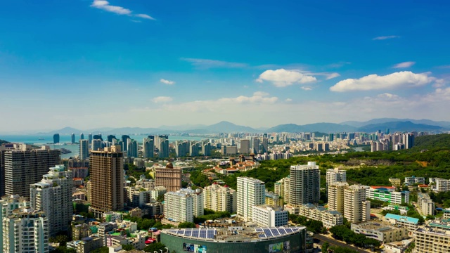 阳光明媚的一天三亚城市景观航拍全景图时间间隔4k中国视频素材