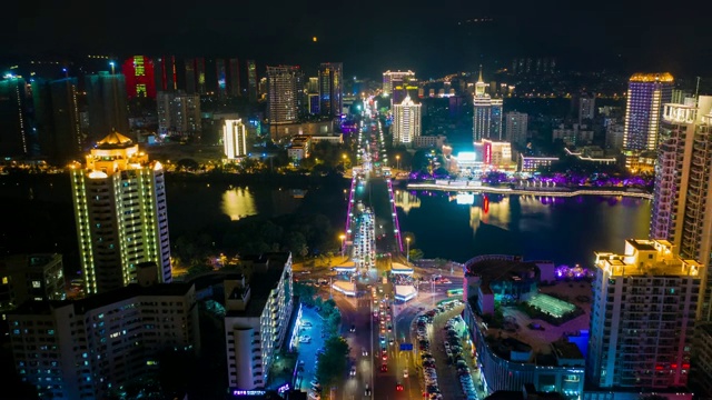 夜光照亮三亚河交通大桥街道航拍时光流逝4k中国视频素材