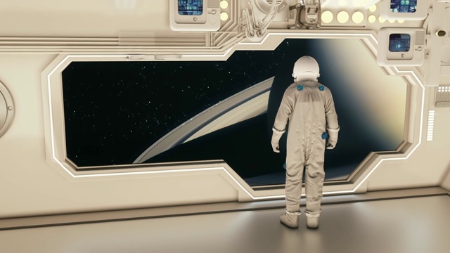 在宇宙飞船上观看土星的宇航员视频素材