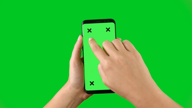 使用绿色屏幕显示色度键的智能手机4k 4k视频素材