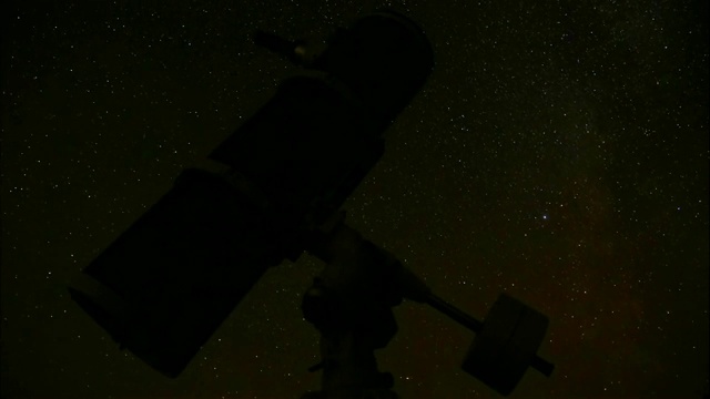 时间流逝望远镜在星空下的背景视频下载