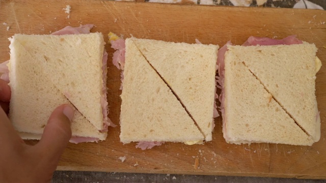 用刀切美味的三明治，特写视频下载