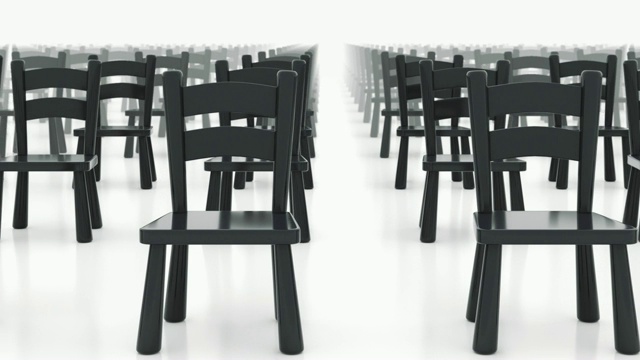 一排排的黑色椅子。视频下载
