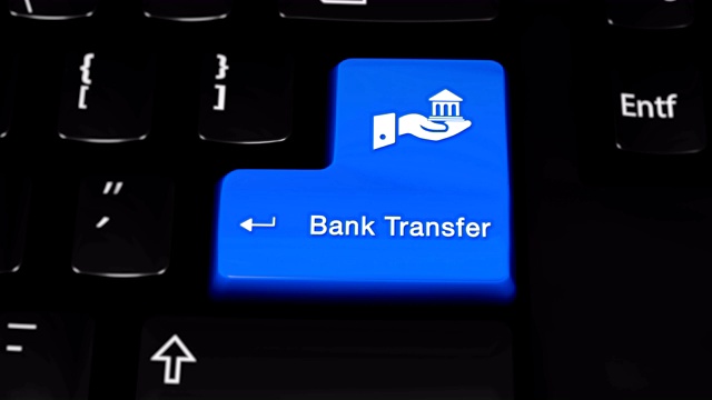 银行转帐旋转运动电脑键盘按钮。视频下载