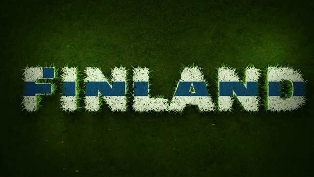 芬兰国旗出现在生长的草地上视频下载