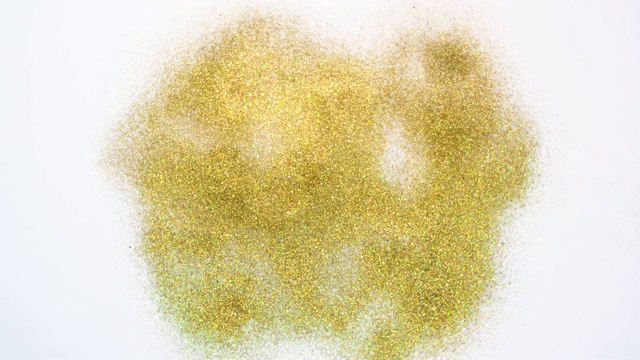 闪光的字母N-爆炸的金色闪光散景在白色的背景视频下载