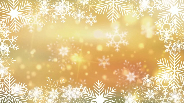 美丽的雪花旋转在一个金色的背景镜头光晕散焦视频素材