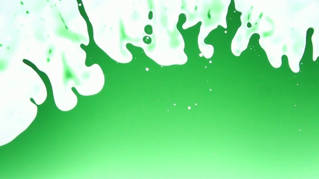 绿色斑点背景与梦幻般的抽象形状。理想的创意项目视频素材