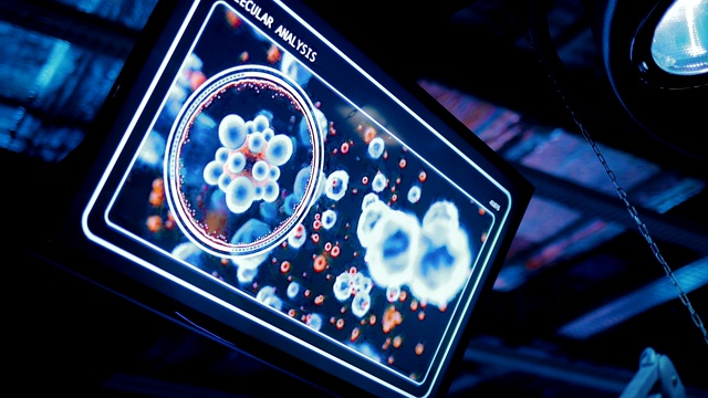 细胞和分子在屏幕上的运动。实验室的医疗设备。视频素材
