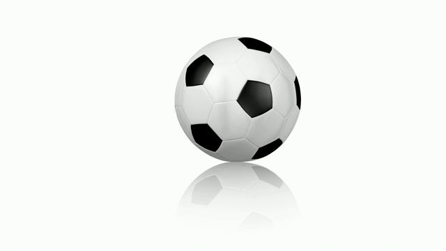 足球在白色反光地板上转动视频素材