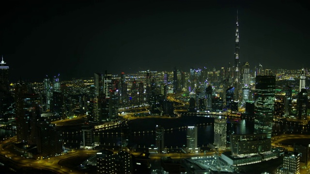 空中照明的哈利法塔商业湾迪拜湾视频下载