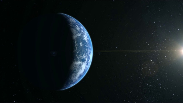 地球从太空。地球正在靠近并向左移动。照相机飞来飞去。星星闪烁。4 k。右边的一小部分被太阳照亮。视频素材