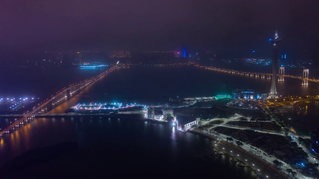 夜间照明澳门城市交通海湾道路航拍全景图4k时间间隔中国视频素材