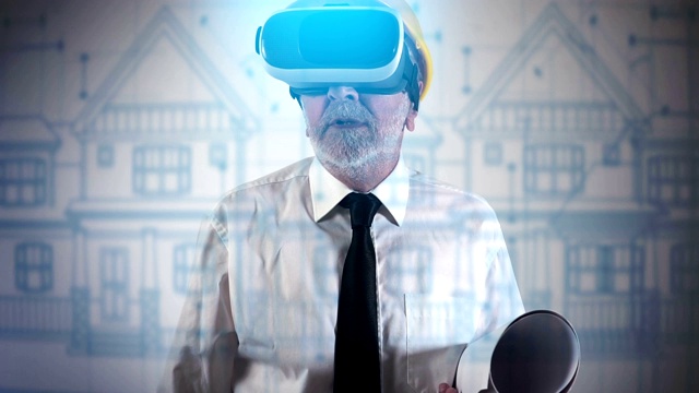建筑师使用VR头盔探索建筑蓝图视频素材