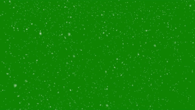 孤立的雪花落在绿色屏幕上。4 k视频素材