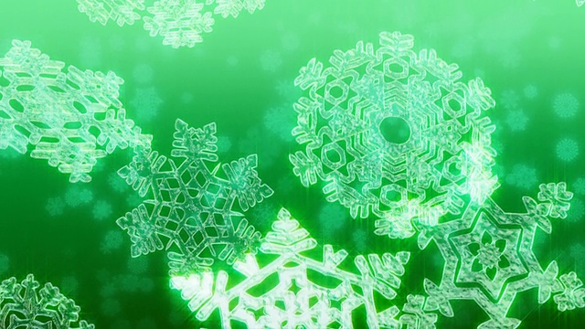 巨大的圣诞雪花在绿色的背景下飘落。Loopable。视频下载