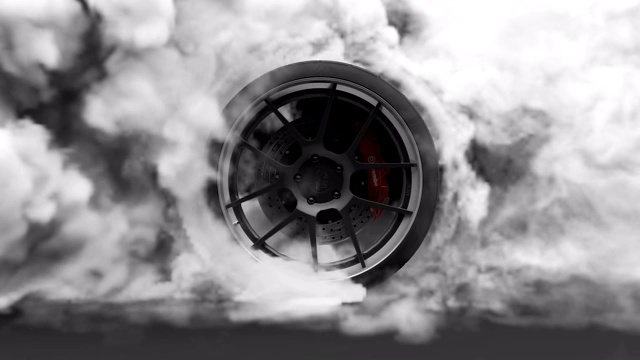 轮胎倦怠。燃烧的橡胶和冒烟的轮胎与旋转的车轮与浓烟在黑暗的背景。视频下载
