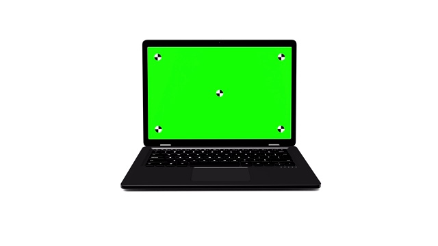 黑色现代笔记本电脑出现在白色背景上。打开绿色屏幕视频素材