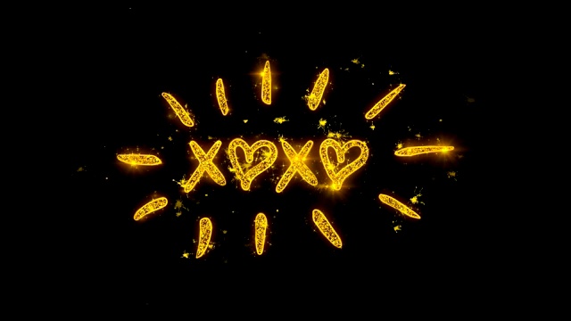 XOXO情人节字体用金色颗粒写的火花烟花视频下载