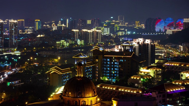 夜晚时间照亮了三亚市风景著名的九树酒店屋顶全景4k海南岛中国视频素材