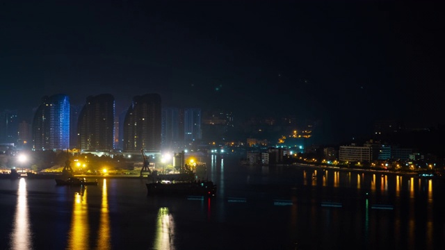 夜晚的时间照亮了三亚工业湾全景4k海南岛中国视频素材