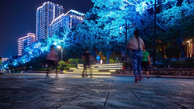 夜晚的时间照亮了三亚市江湾舞蹈课全景4k海南岛中国视频素材