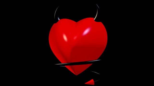移动红色的心与角和尾巴在黑色的背景视频素材