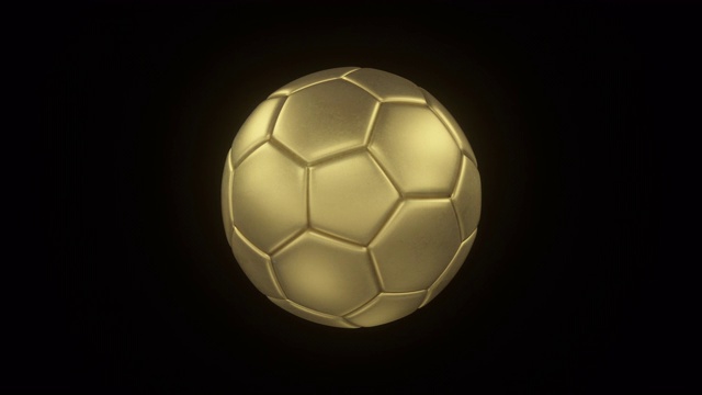 旋转的青铜足球在黑色孤立的背景视频下载
