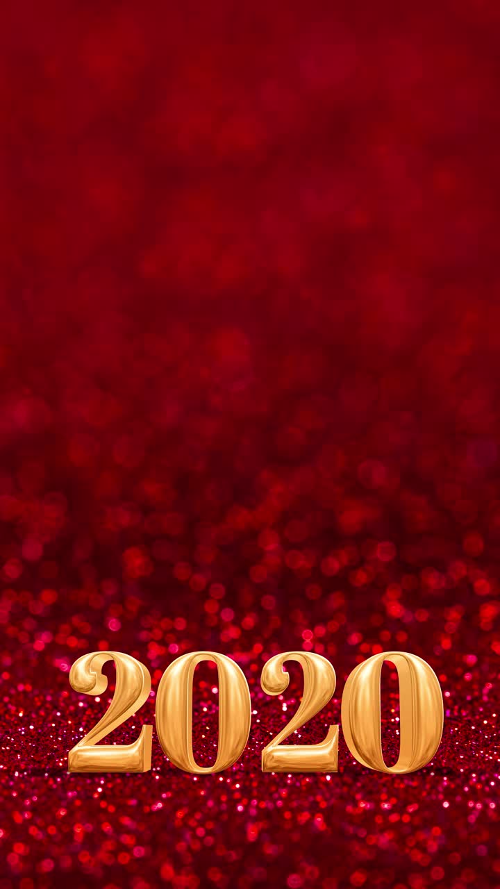 垂直新年2020年与飞bokeh在闪闪发光的红色地板工作室背景，节日庆祝贺卡视频素材