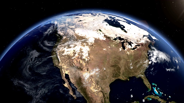 从太空看地球上方的日出。接近美国地区的晚上时间和日出4K。视频下载