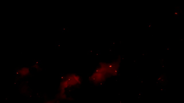 燃烧着的红色炽热的火花从夜空中升起。以火、光和生命为主题的美丽抽象背景。炽热的橙色发光飞行粒子在黑色的背景视频素材