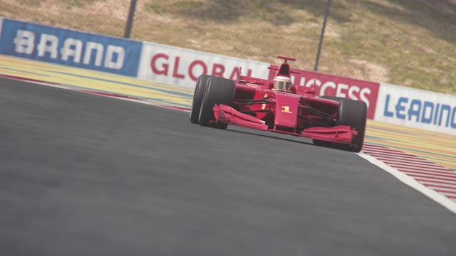 红色的一级方程式赛车穿过终点线视频素材