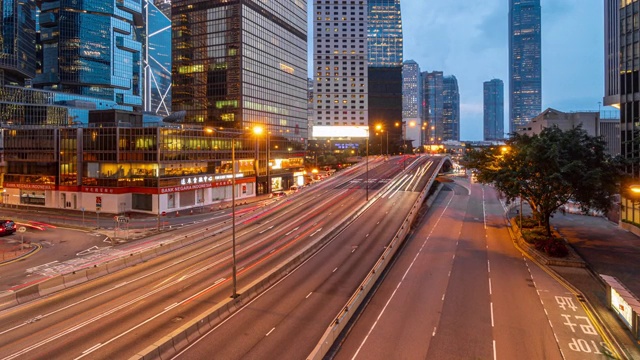4K时间推移场景的香港城市景观在白天到晚上的时间视频素材