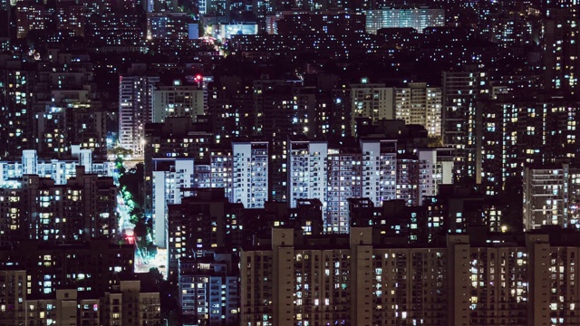 T/L TU鸟瞰图，夜间窗户闪烁/北京，中国视频素材