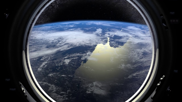 地球通过国际空间站的舷窗。空间站绕地球运行。现实的气氛。3 d体积云。空间。国际空间站。4 k。视频素材