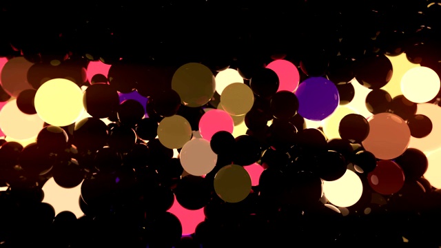 黑色背景上的彩色反光发光球。数字动画3d渲染。4K，超高清分辨率视频素材