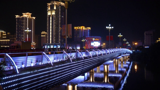 夜景时间照明三亚市滨江交通大桥全景4k中国海南视频素材