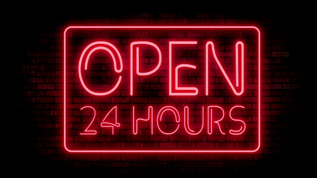 24小时红霓虹灯在砖墙上开放。24小时夜店酒吧闪烁霓虹灯。运动动画。视频素材