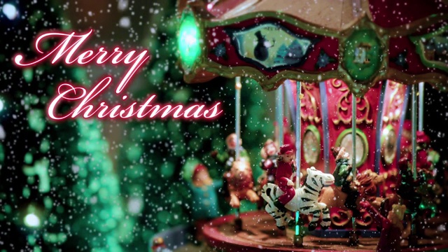 圣诞快乐文字排版设计在红色与旋转木马的玩具满灯的背景下的雪-圣诞活动的概念视频素材