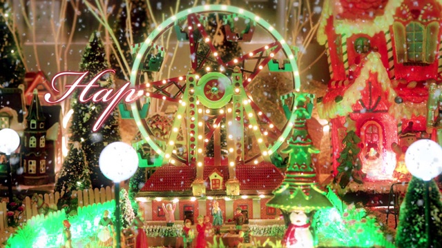 新年快乐文字排版设计在红色与大车轮的玩具满灯在雪的背景下-新年和圣诞节的活动概念视频下载