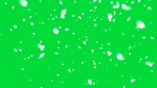 4K雪花落在绿色屏幕上视频素材