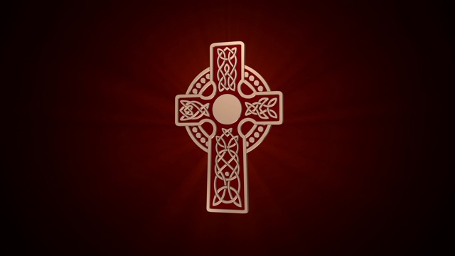 凯尔特金十字架围绕着一个深红色的背景轴旋转视频下载