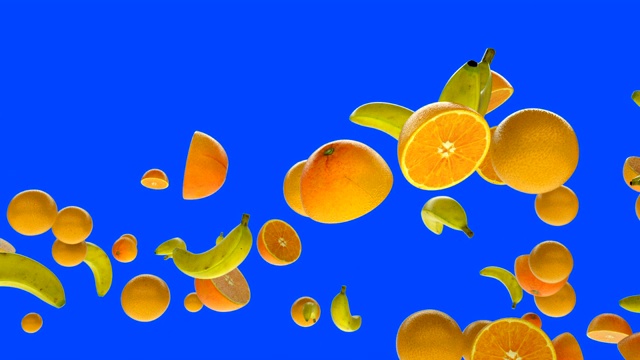 新鲜的香蕉和橙子在蓝屏上的慢动作飞行视频素材