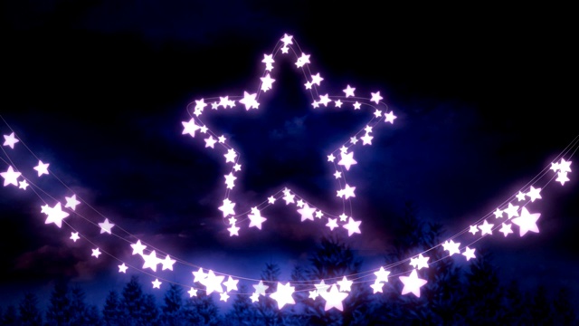 发光的星星和一串仙女灯在蓝色的背景视频下载