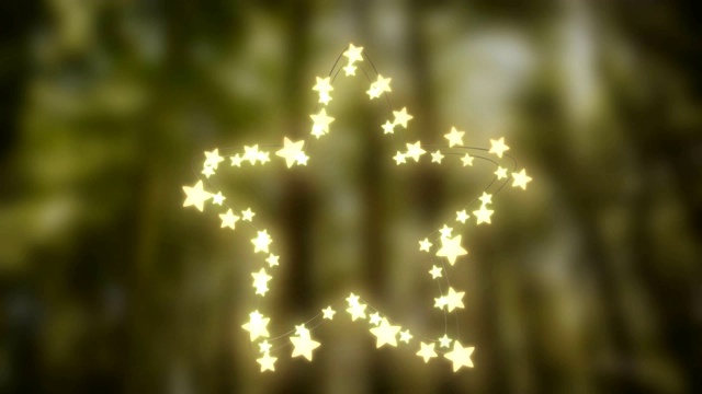 在散焦的背景上发光的仙女灯的星星视频下载
