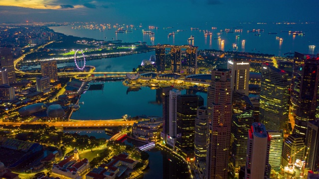 从夜到日，新加坡商业区的太阳升起时的景象视频下载