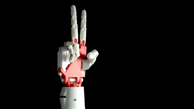 机器人编程假肢手显示岩石手势和胜利标志在黑色背景视频下载